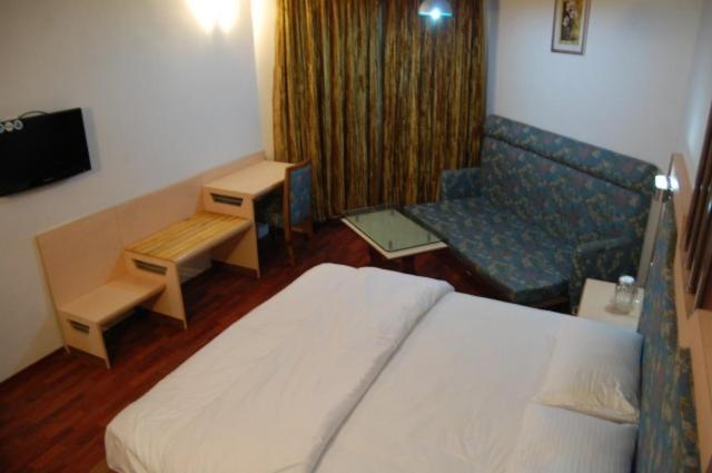 Pleasant Stay Kodai Hotel Pvt. Ltd. Kodaikanal Pokoj fotografie